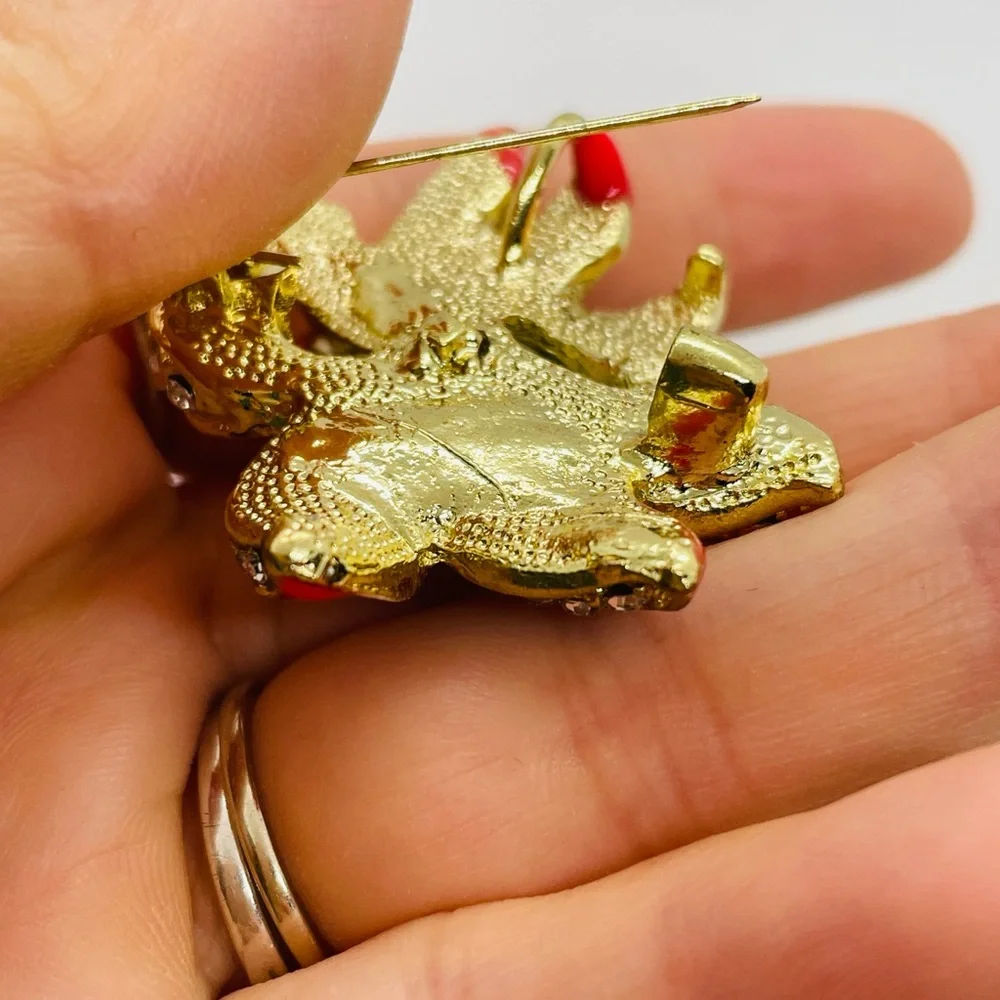 Elegant Gold and Red Floral Brooch